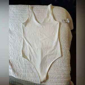 Abercrombie & Fitch soft collection white body suit. Size Medium, deep v-neck